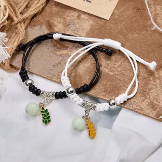 Glow-in-the-Dark Leaf Charm Braided Bracelet for Couples, Adjustable Woven Cord with Alloy Beads & Enamel Leaf Pendant, Black & White Pair Set